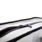 Close-up of the Sidekick's wide zip top partly open with a large zipper pull