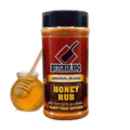 Load image into Gallery viewer, Red-labeled Butcher BBQ Honey Rub shaker, 12.5 oz, next to a jar of honey with a wooden dipper
