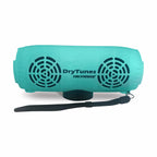 Teal Yak Power DryTunes speaker from the front, with two speaker grilles, the magnetic base and a wrist strap