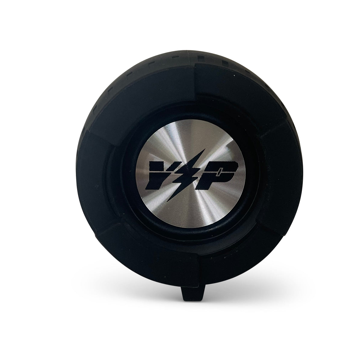 End of the black DryTunes speaker showing the round metal Yak Power cap