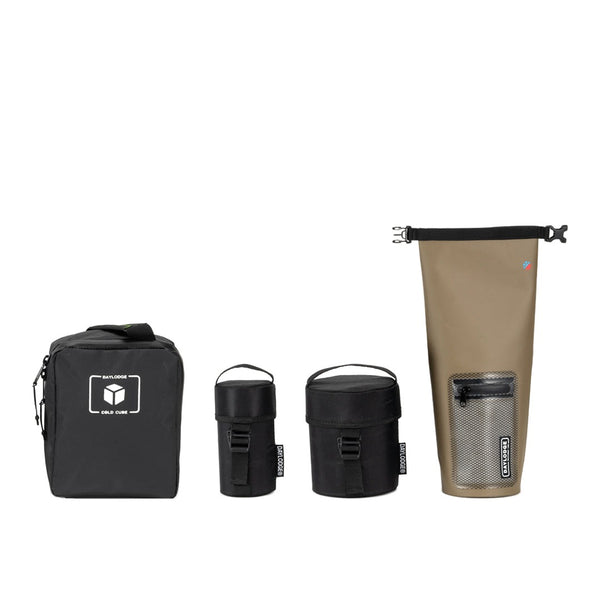 Cold Cube soft cooler, two insulated canisters and a tan dry bag on white