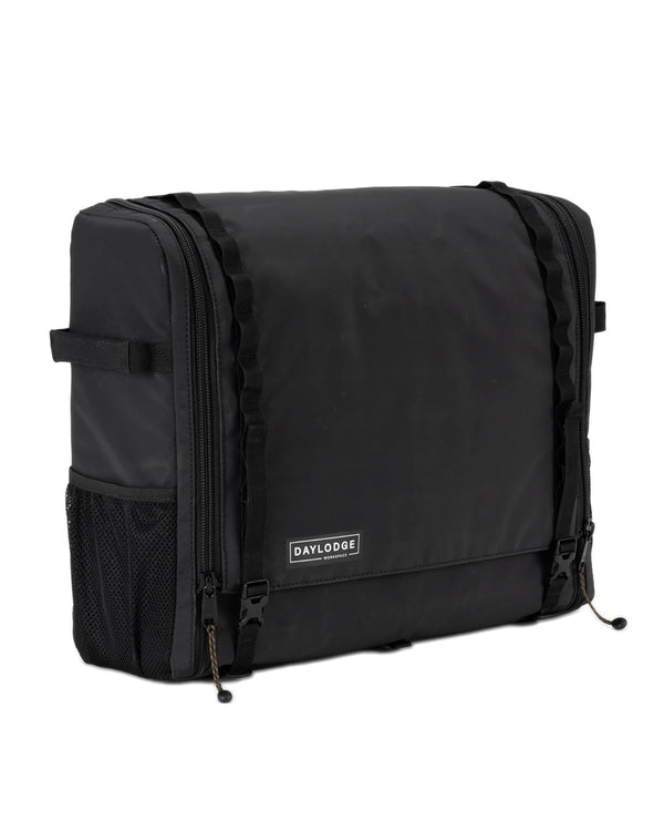 Closed black Workspace Field Bag, front view, on white