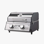 Angled view of the G22 grill with black side panels, the window in the lid, a thermometer and a side latch